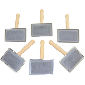 May include: Six silver and gray grooming brushes with wooden handles. The brushes are arranged in a star shape on a white background.