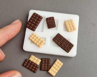 Molde de chocolate em miniatura: Argila polimérica, silicone próprio para alimentos.