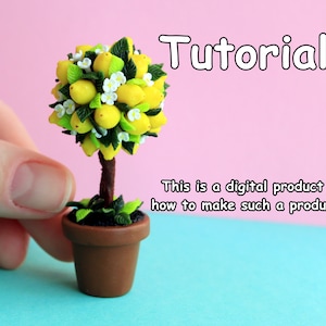 May include: A miniature lemon tree with yellow lemons and white flowers in a brown pot. The tree is on a blue surface. The text "Tutorial" is in the upper right corner of the image. The text "This is a digital product how to make such a product" is in the lower right corner of the image.