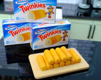 Miniature Twinkies packaged in plastic for 1:6 Scale Dolls Food. Handmade by Nadia Michaux