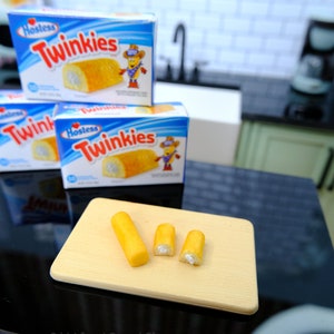 Miniature Twinkies packaged in plastic for 1:6 Scale Dolls Food. Handmade by Nadia Michaux Halved Twinkies set