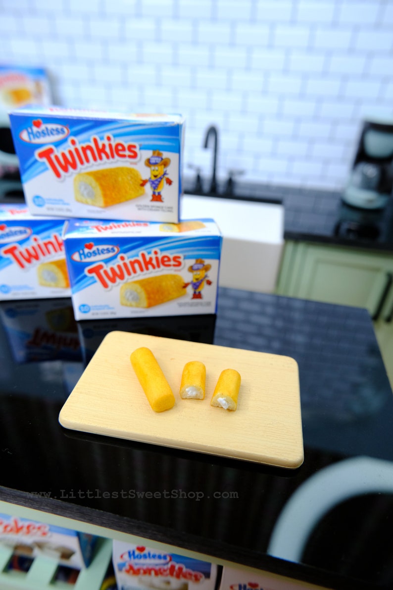 Miniature Twinkies packaged in plastic for 1:6 Scale Dolls Food. Handmade by Nadia Michaux Halved Twinkies set