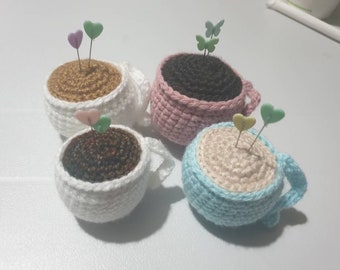 Tea cup pin cushion with pins