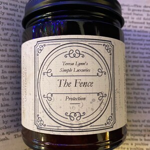 The Fence, Protection and Boundary Setting Wooden Wick Soy Wax Candle in a dark Amber jar with a metal lid.Cedar and Redwood cleansing and protection blessings.
Cedar wood and Redwood essential oil, when used for charms are often referred to as “The fence” due to its powerful characteristic of forcing harmful projections out and keeping protective powers in. Crafted in Monrovia, Indiana at Teresa Lynns Simple Luxuries