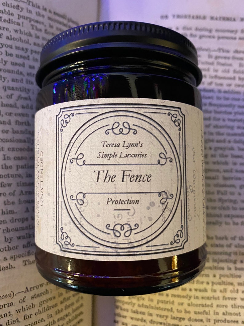 The Fence, Protection and Boundary Setting Wooden Wick Soy Wax Candle in a dark Amber jar with a metal lid.Cedar and Redwood cleansing and protection blessings.
Cedar wood and Redwood essential oil, when used for charms are often referred to as “The fence” due to its powerful characteristic of forcing harmful projections out and keeping protective powers in. Crafted in Monrovia, Indiana at Teresa Lynns Simple Luxuries