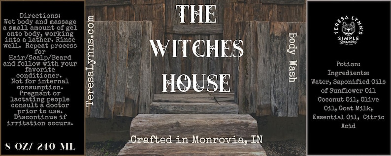 Graphic of the label showing The Witches House in spider web covered font, Crafted in Monrovia, IN.  Potion: Water, Saponified Oils of Sunflower, coconut and olive, goat milk, essential oil, citric acid.The background is a wooden shack with steps.