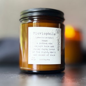 Pluviophile - Storm Lover,  Wooden Wick Soy Wax Candle with a Blend of Leather, Patchouli, Vanilla, and Tea Leaves