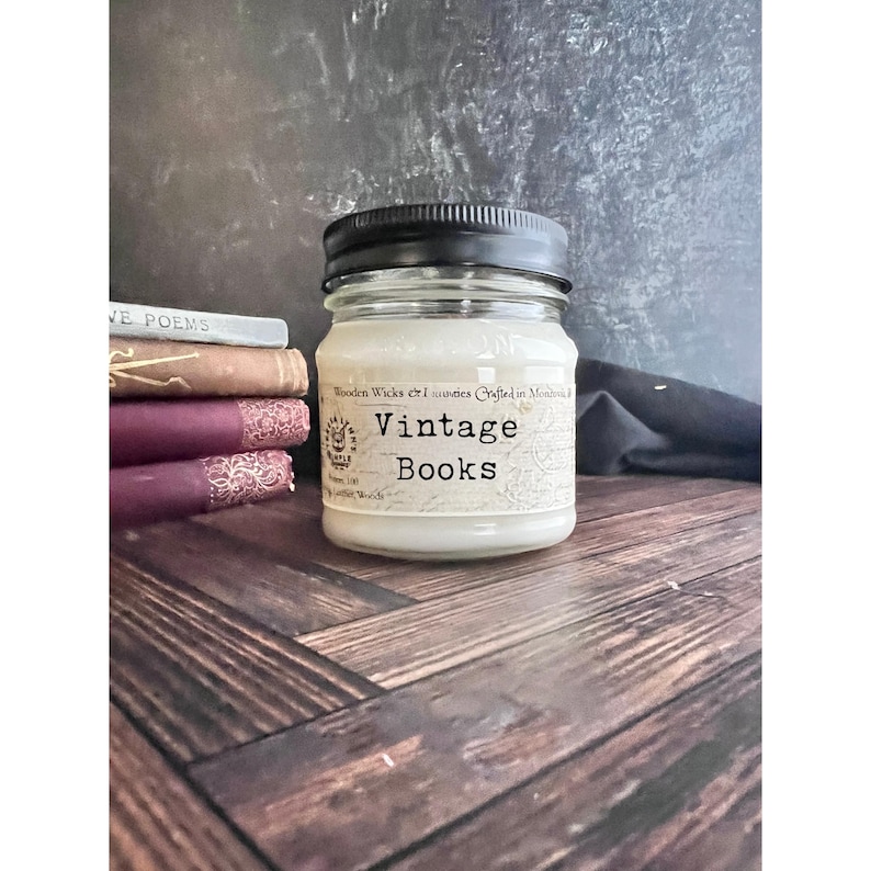 May include: A white ceramic mug with a black handle and the text "But First, Coffee" in a handwritten style. The mug is on a white surface. The mug is approximately 4 inches tall.