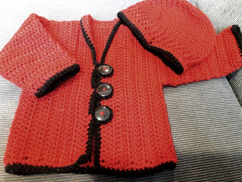 baby setred and blackssweaters and hats
