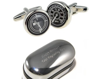 May include: Silver cufflinks with a black and white speedometer design. The cufflinks come in a silver gift box with the text "Happy Birthday Your Engraving Here".