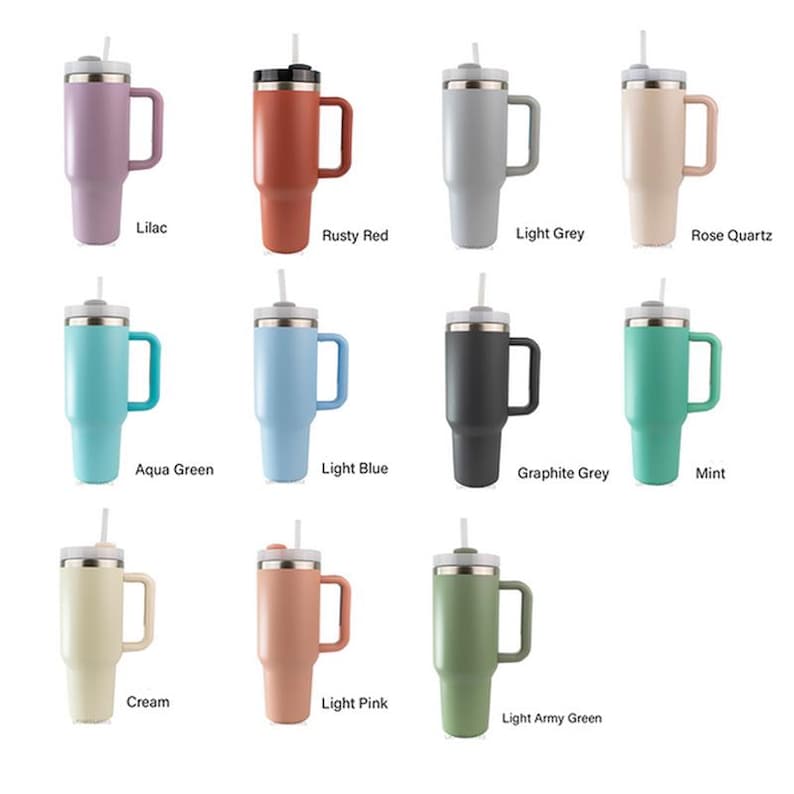 May include: An assortment of insulated travel mugs in shades like lilac, rusty red, light grey, and rose quartz. Each mug has a handle, lid, and straw. Other colours include aqua green, light blue, graphite grey, mint, cream, light pink, and light army green.