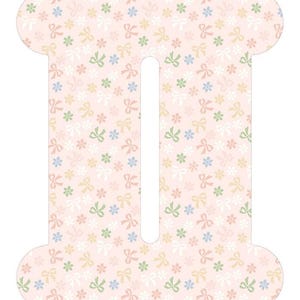 May include: A capital letter I shaped cutout featuring a light pink background with a repeating pattern of small white, yellow, green, and blue flowers interspersed with tiny light pink bows across the entire surface of the letter.
