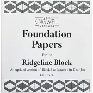 May include: White square package of "Foundation Papers" for the "Ridgeline Block" by Jen Kingwell Designs. The package has a geometric border design in black and gray. The text reads "144 Sheets".