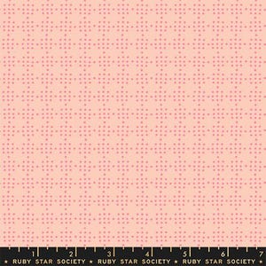 May include: A fabric with a repeating pattern of small, pink dots arranged in a grid-like design on a light peach background. The fabric has a textured appearance and is suitable for various sewing projects. The text "RUBY STAR SOCIETY" is at the bottom.