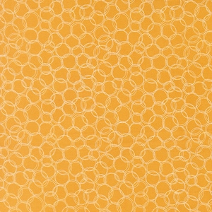 May include: Close-up of a fabric with a repeating pattern of white, overlapping circles on a golden-yellow background. The circles are drawn with a thin, sketchy line, creating a textured appearance. The fabric has a woven texture.