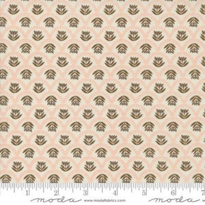 May include: A white fabric with a repeating pattern of brown stylized flowers and pink arches. The fabric is marked with a ruler in inches.