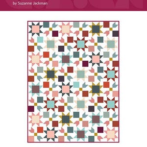 May include: A quilt pattern called "Nora" by Suzanne Jackman, featuring a repeating pattern of stars in shades of red, pink, blue, green, and gold on a white background.