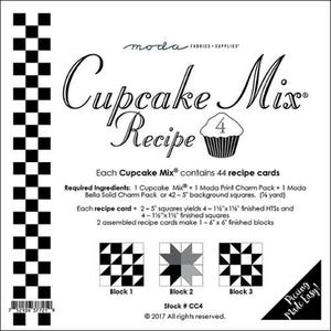 May include: Black and white checkered fabric with a cupcake graphic and the text "Cupcake Mix Recipe". The image also includes instructions for making a quilt block with the text "Block 1", "Block 2", and "Block 3".