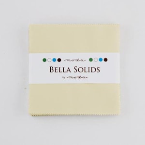 May include: A 5-inch square of pale yellow fabric from the Bella Solids line by Moda Fabrics.