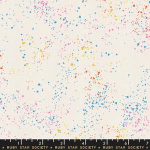 May include: Off-white fabric with a colorful splatter pattern. The design features small, irregular dots in shades of blue, pink, yellow, and orange scattered across the surface. The text "RUBY STAR SOCIETY" is at the bottom.