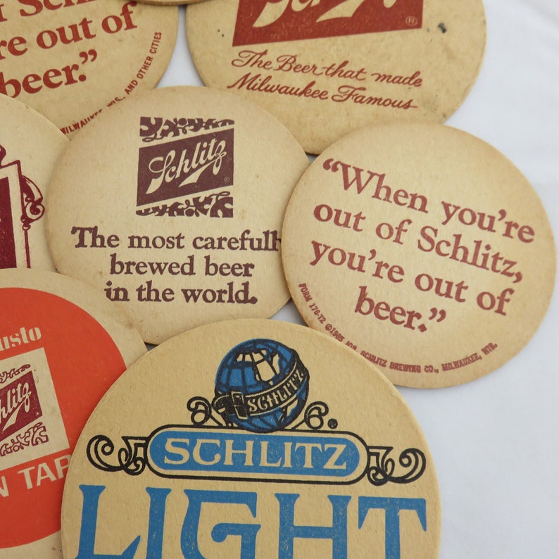 Mismatched instant collection of Schlitz beer 1970s 70s paper drink