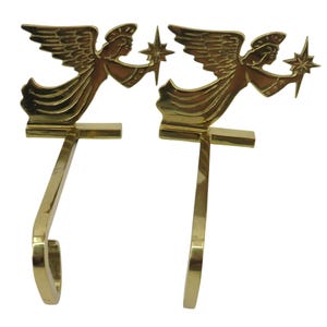 VTG Par de 2 soportes para calcetines navideños de metal de latón con forma de ángel y estrella navideña