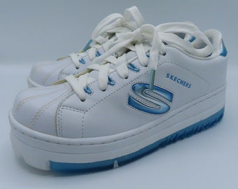 white platform trainers 90s