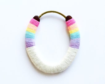 lucky yarn wrapped horseshoe pastel rainbow brite