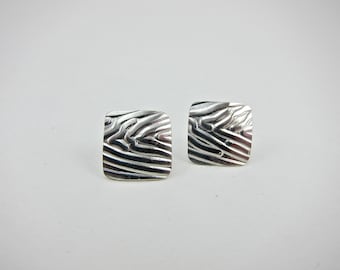 sterling silver earrings. square, textured, studs