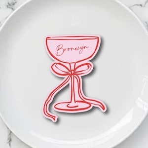 Segnaposto per cocktail, segnaposto per addii al nubilato, sottobicchieri con nome, segnaposto con nastro, biglietti con nome degli ospiti, nastri e segnaposto per baby shower con champagne
