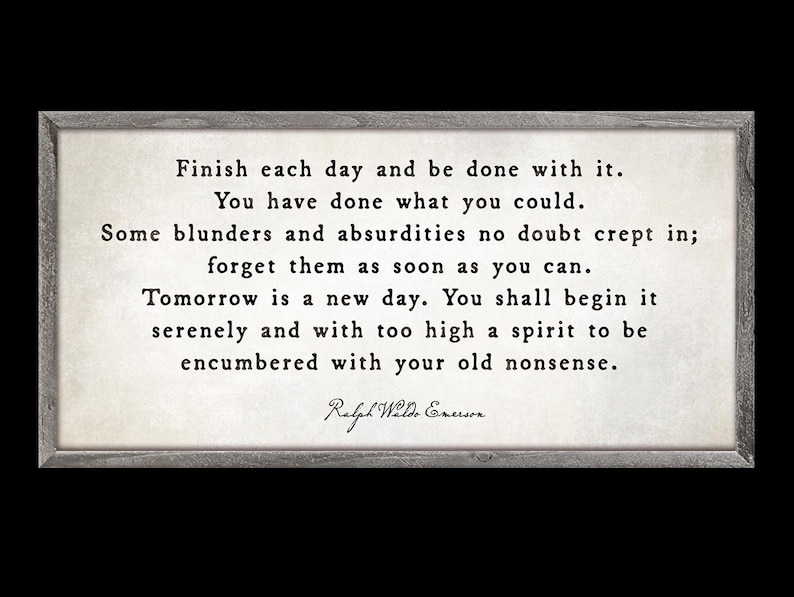 May include: A rectangular wooden sign with a gray frame. The sign features a quote by Ralph Waldo Emerson in black text on a cream-colored background. The quote reads, "Finish each day and be done with it..."