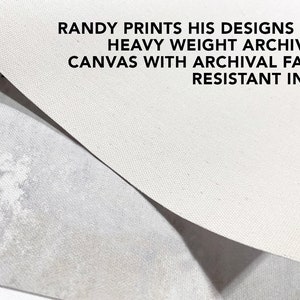 May include: Close-up of a white canvas texture. The text "RANDY PRINTS HIS DESIGNS ON HEAVY WEIGHT ARCHIVAL CANVAS WITH ARCHIVAL FADE RESISTANT INKS" is printed on the canvas.