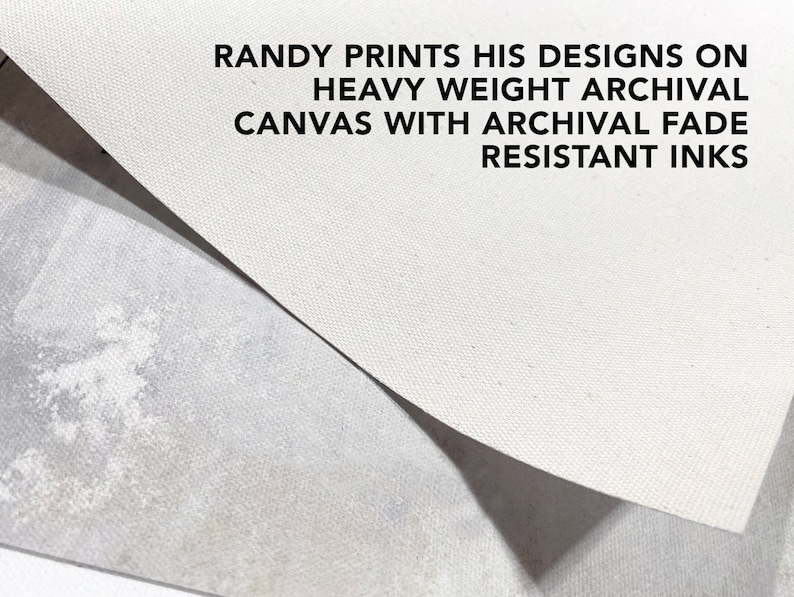 May include: Close-up of a white canvas texture. The text "RANDY PRINTS HIS DESIGNS ON HEAVY WEIGHT ARCHIVAL CANVAS WITH ARCHIVAL FADE RESISTANT INKS" is printed on the canvas.