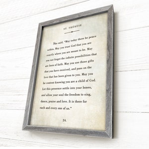 St Therese quote is a barn wood framed, book page sign that is heirloom quality craftsmanship. Choose your frame & canvas colors!