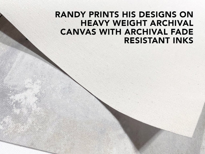 May include: Close-up of a white canvas texture. The text "RANDY PRINTS HIS DESIGNS ON HEAVY WEIGHT ARCHIVAL CANVAS WITH ARCHIVAL FADE RESISTANT INKS" is printed on the canvas.