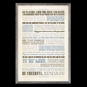 May include: A framed print with a white background and brown text. The text is a poem titled "Desiderata" by Max Ehrmann. The poem is about living a peaceful and fulfilling life. The print is framed in a light gray wood frame.