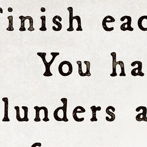 May include: Close-up of a textured, off-white background with dark brown text. The text reads "Finish each", "You have", and "blunders an". The font is a serif style with a vintage aesthetic.