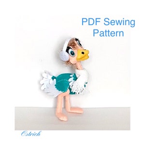 May include: A plush ostrich toy with a teal body, white wing accents, and a yellow beak. It wears a white scarf and earmuffs. The text "PDF Sewing Pattern" is displayed above the ostrich, and the word "Ostrich" is below.