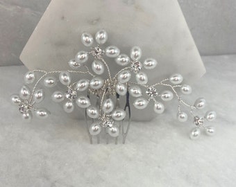 Peineta de flor de perla: cristal de diamante, bañada en plata de ley