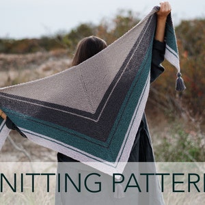 May include: A knitting pattern for a triangular shawl with a striped design in shades of gray, green, and white. The shawl has tassels on the ends.