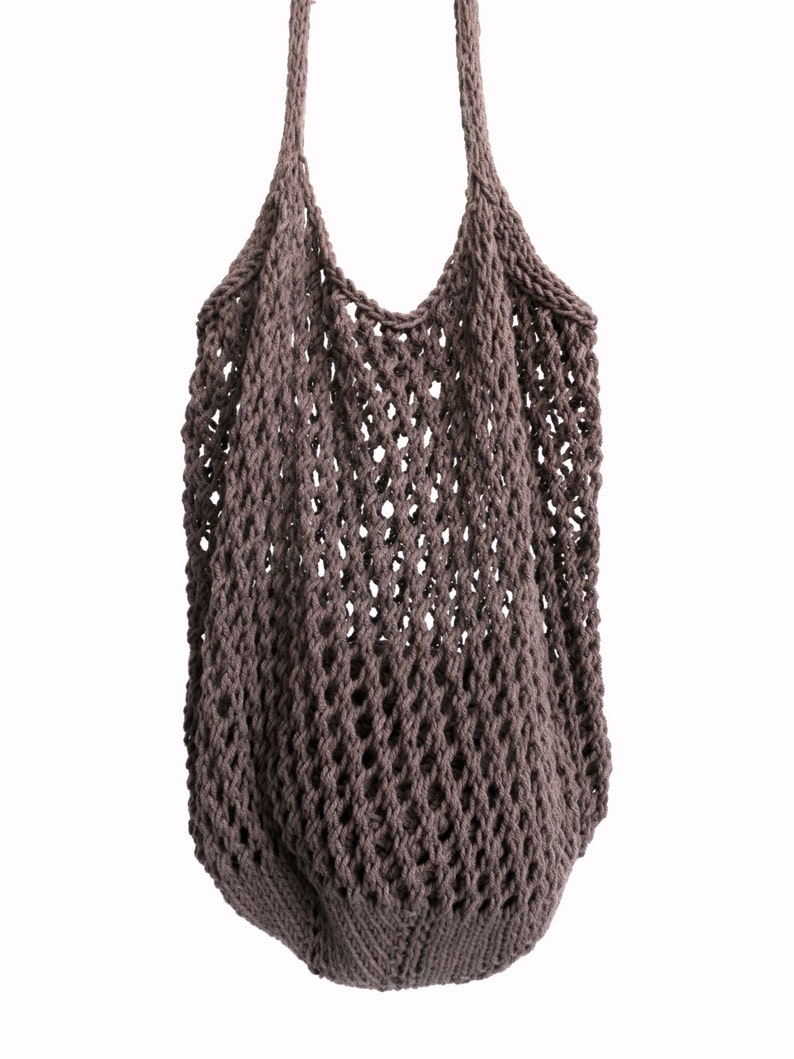 May include: A brown crocheted string bag with a wide, open top and two long handles.
