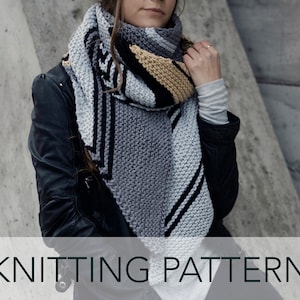 May include: A knitting pattern for a triangular scarf with a geometric design in shades of gray, black, and yellow.