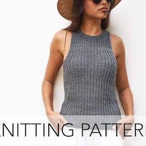 May include: A grey sleeveless knitted top with a ribbed texture. The top has a high neckline and a cropped length.