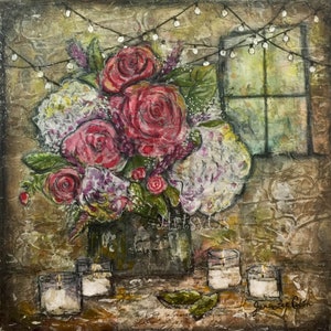 May include: An artistic painting of a floral arrangement with red roses and white hydrangeas in a green vase. The painting includes lit candles, a window, and string lights, creating a warm, inviting ambiance. The artist's signature is visible.