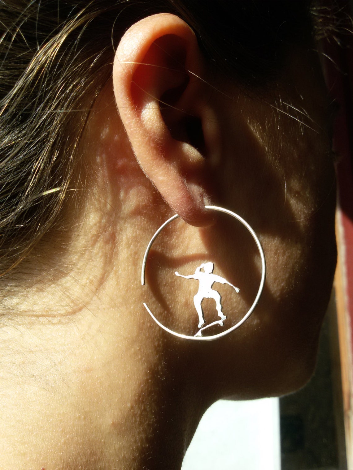 Skateboard stud earrings Clearance