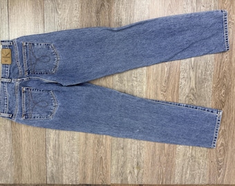 Jean Mom 26" taille 29" entrejambe Calvin Klein Small taille haute délavage moyen 90's jambe droite