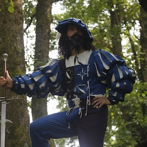 Full landsknecht costume for historical reenactment of the German renaissance, costume consisting of doublet, shirt, hose and barett.