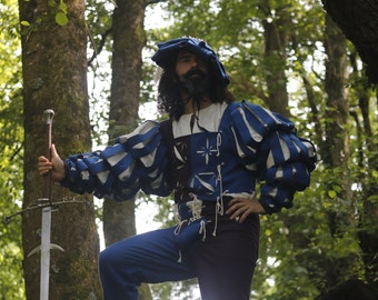 Full landsknecht costume for historical reenactment of the German renaissance, costume consisting of doublet, shirt, hose and barett.