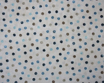 Tessuto patchwork con pois bianchi