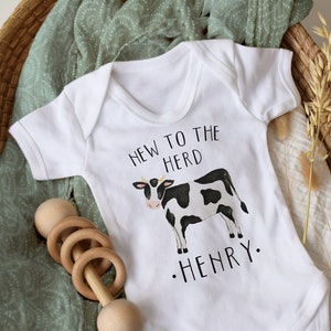 Cow print baby grow discount